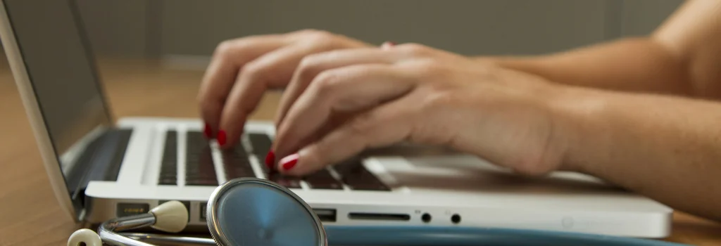 Doctor talking comfortingly to a patient